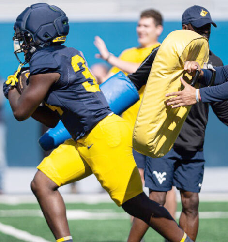 WVU making progress for short-yardage situations, adding size, experience